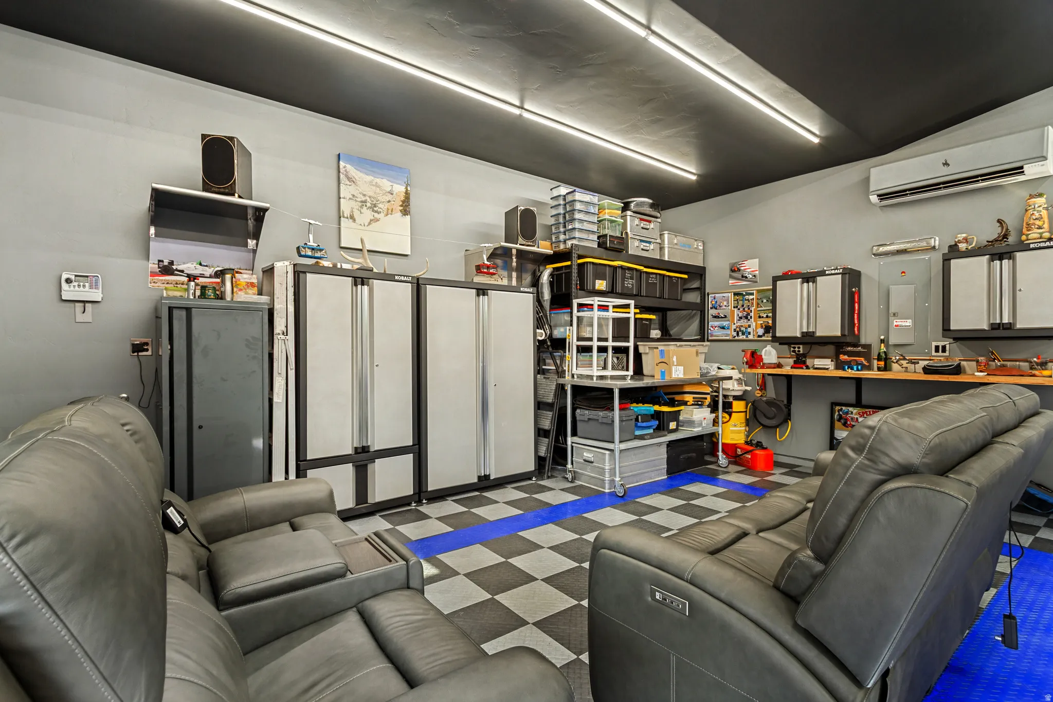 Detached rear Workshop/Garage, approximately 948 sq ft.and features insulated overhead doors, professionally installed copper compressed-air lines around the perimeter, a dedicated ventilated room for grinding and sanding, abundance of electrical outlets.