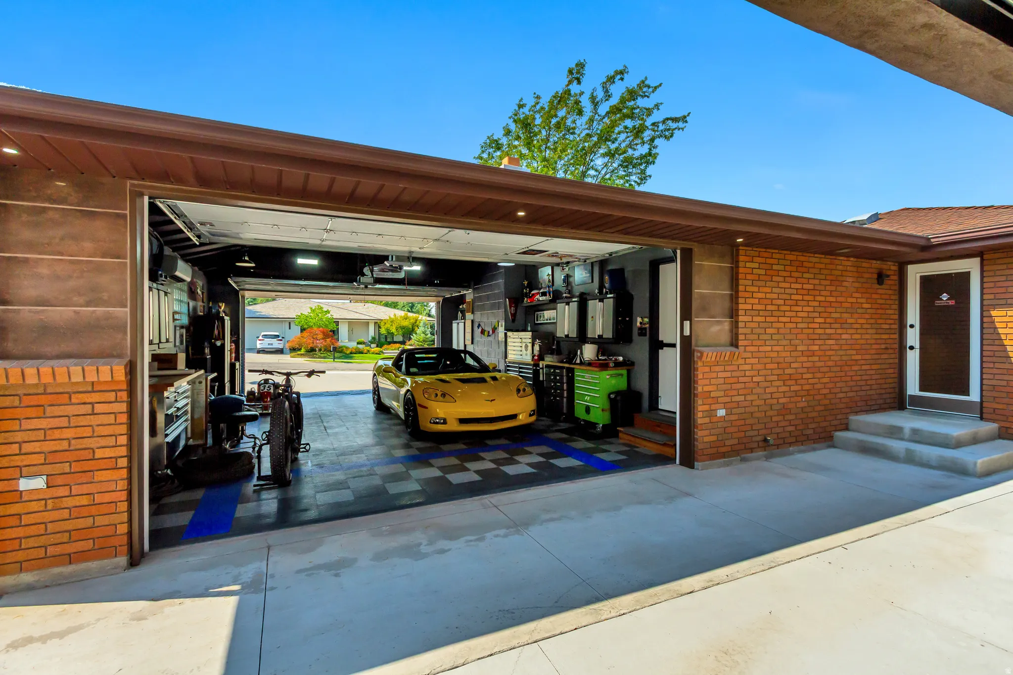 Attached Garage, Approximately 695 sq ft. Double garage doors for front and back access.A/C and Heat