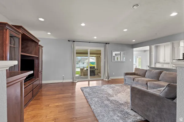 Wood-finish flooring throughout this open-concept living area