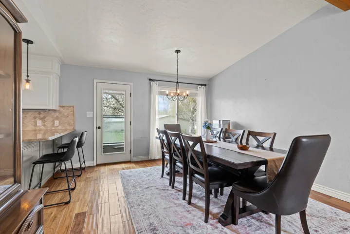 Wood-finish flooring throughout the dining area