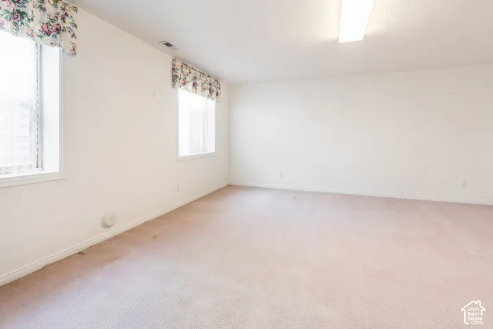 Spacious Basement Bedroom  with large windows and closet