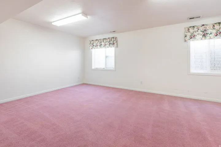 Spacious basement bedroom 3.  Large enough to be used as a family room.