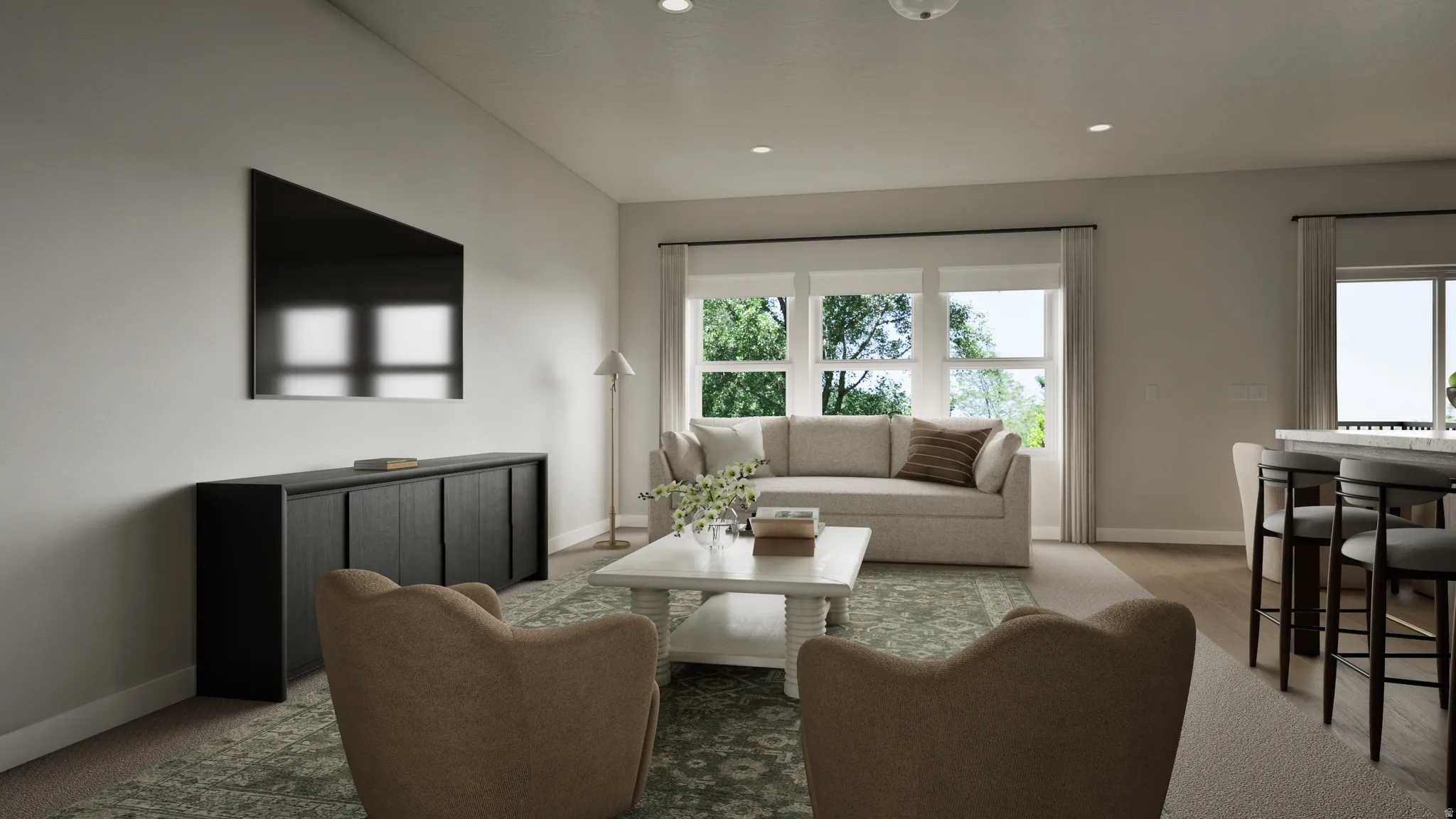 Bright and sophisticated living space featuring floor-to-ceiling glass doors and windows flooding the room with natural light
