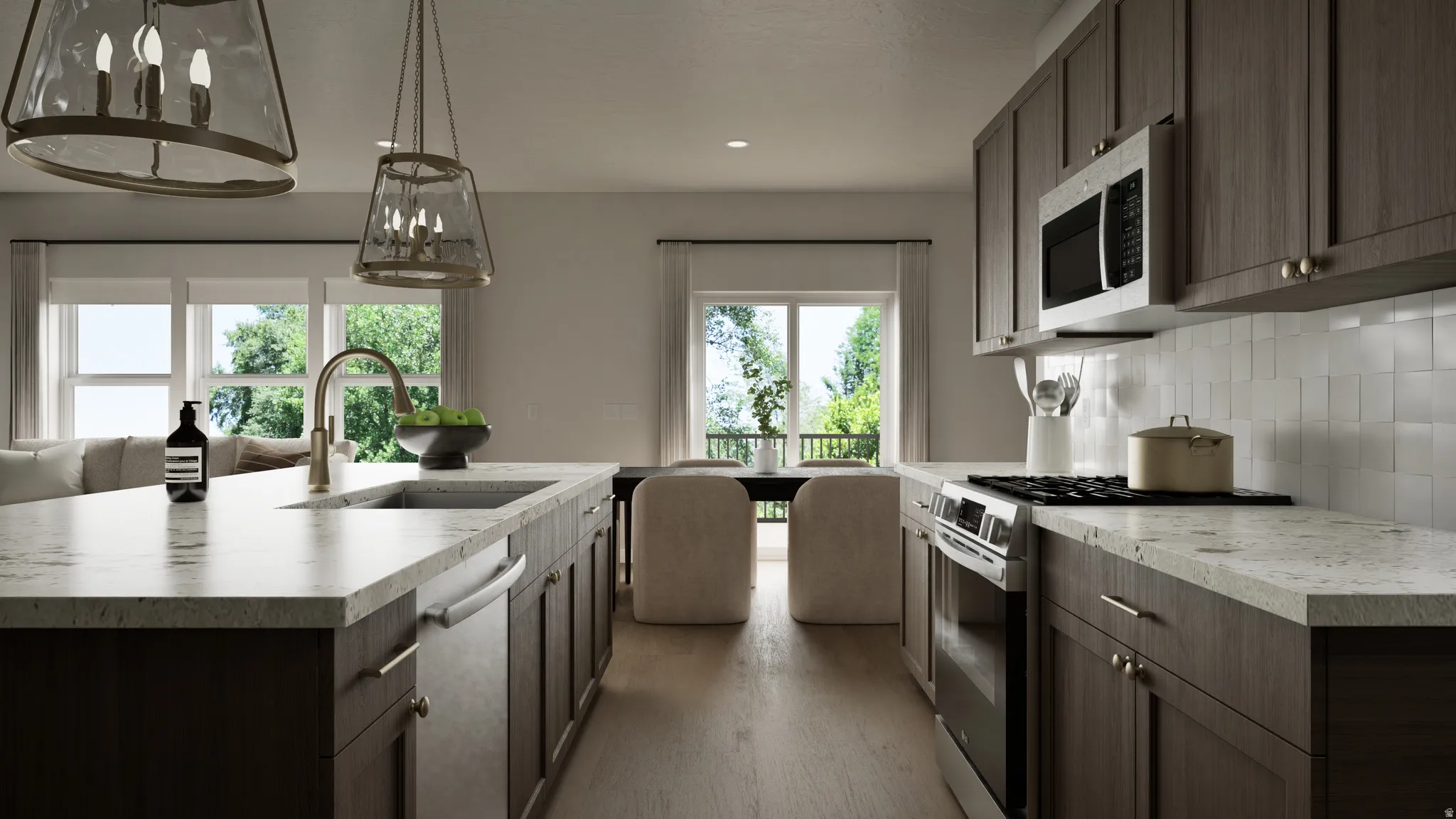 Open-concept kitchen featuring an oversized island with an undermount sink and gooseneck faucet, stainless steel appliances, dark wood-finish cabinetry, and light-toned countertops