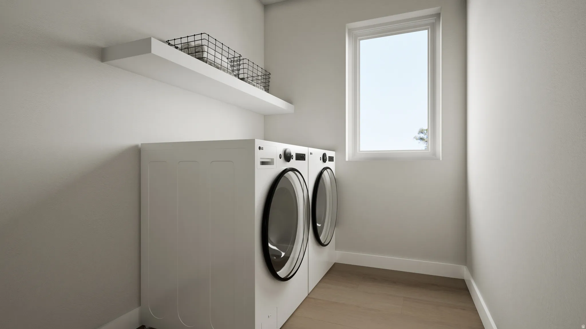 Dedicated laundry area featuring a floating white shelf, light wood-finish flooring, and a single pane window