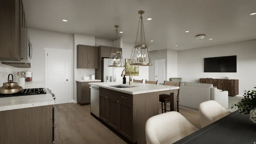 Open-concept kitchen with a central island, light-toned countertops, wood-finish cabinetry, stainless steel appliances, and recessed lighting