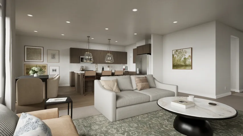 Open-concept living area with integrated kitchen and dining spaces