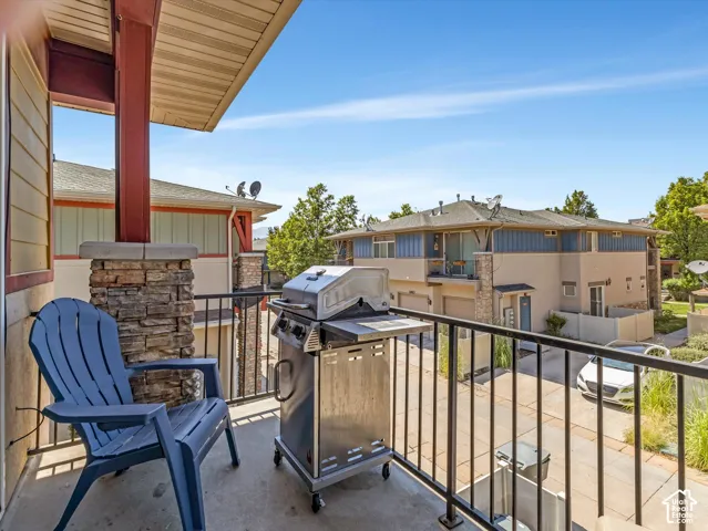 Elevated deck with metal railing and composite decking offers an ideal outdoor entertaining space