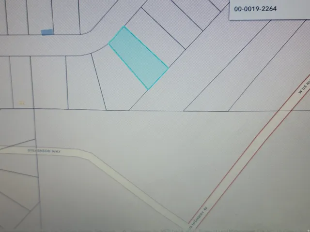 Plat Map. Illustrating the property's boundaries and its position relative to surrounding parcels and roadways