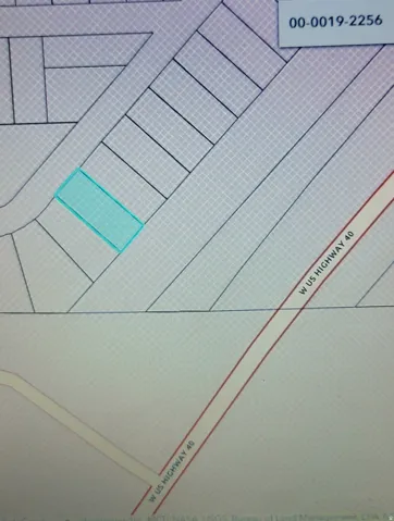 Plat Map. Illustrating the property's boundaries and its relation to adjacent parcels and public thoroughfares
