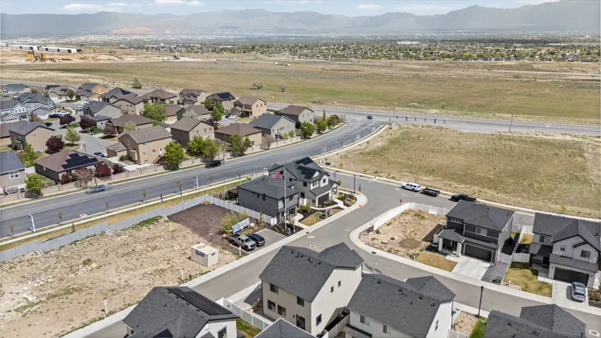 Aerial perspective showcasing a modern residential neighborhood with a variety of housing styles