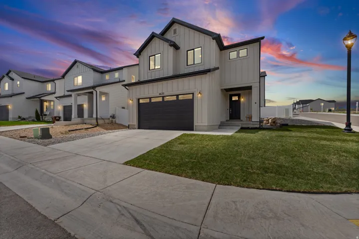 Modern farmhouse-style exterior with vertical board and batten siding