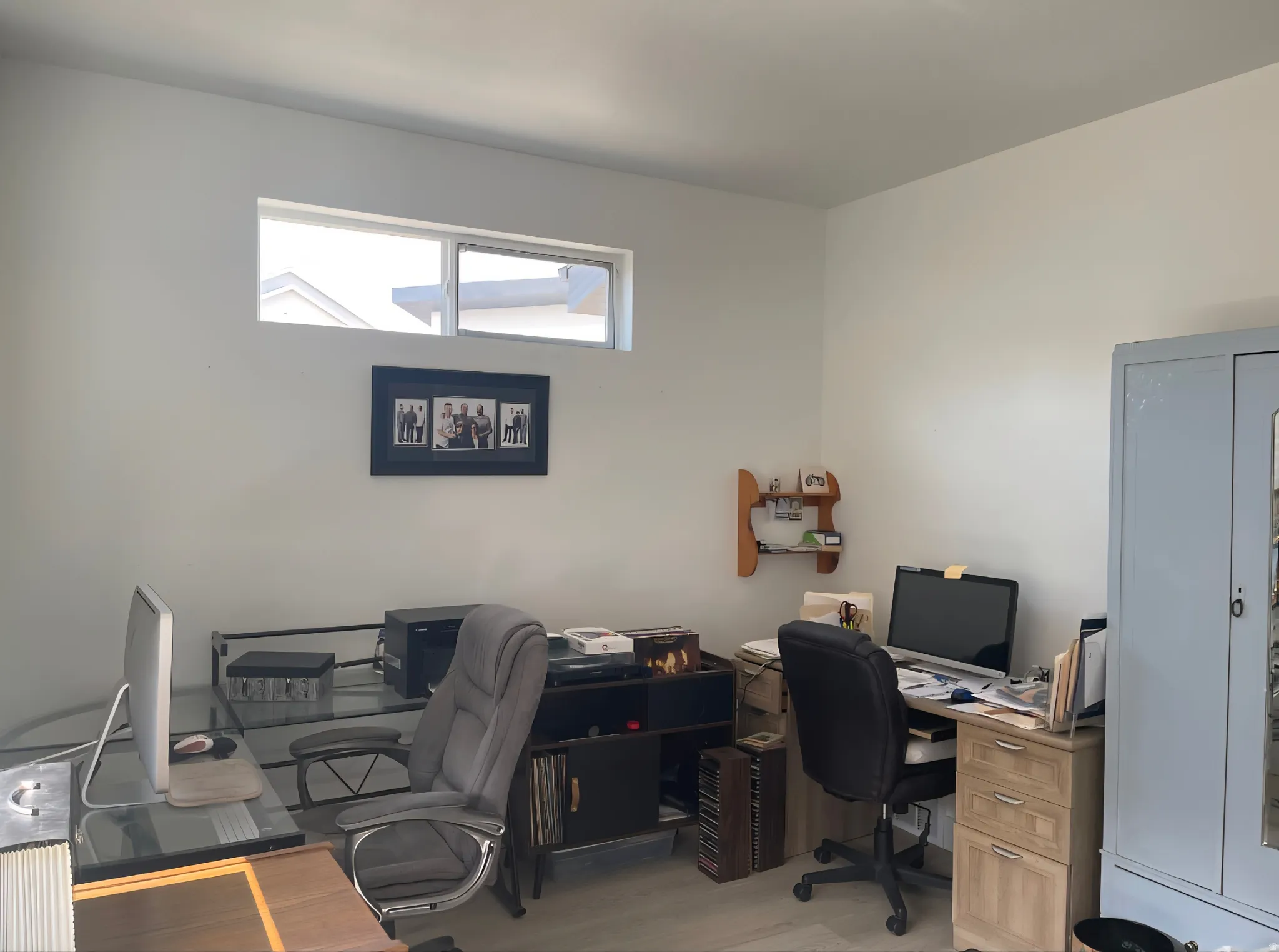 Upstairs bedroom with light colored walls