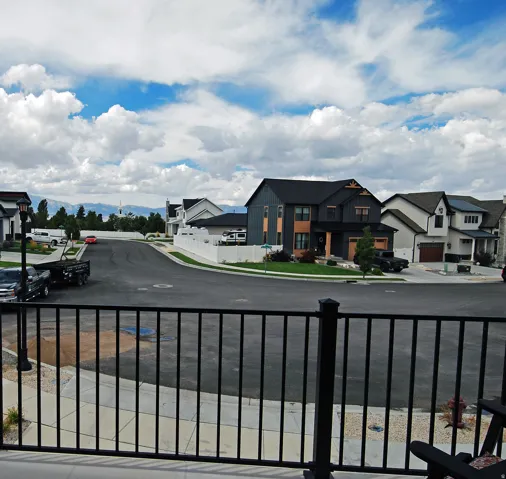 Neighborhood setting featuring modern architectural styles and mountain scenery