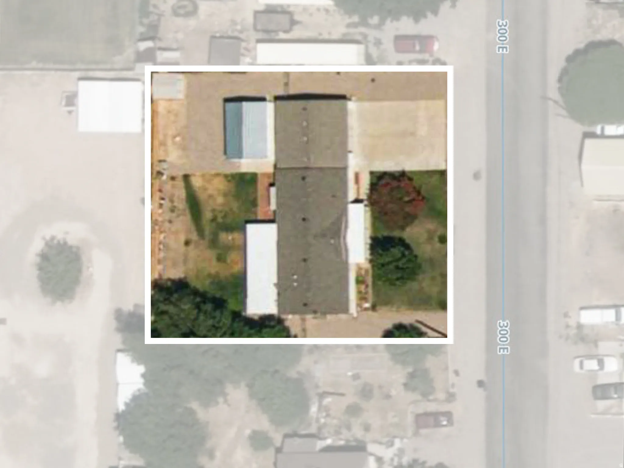 Aerial Property Survey. Overhead documentation of the property layout, structure placement, and landscape features