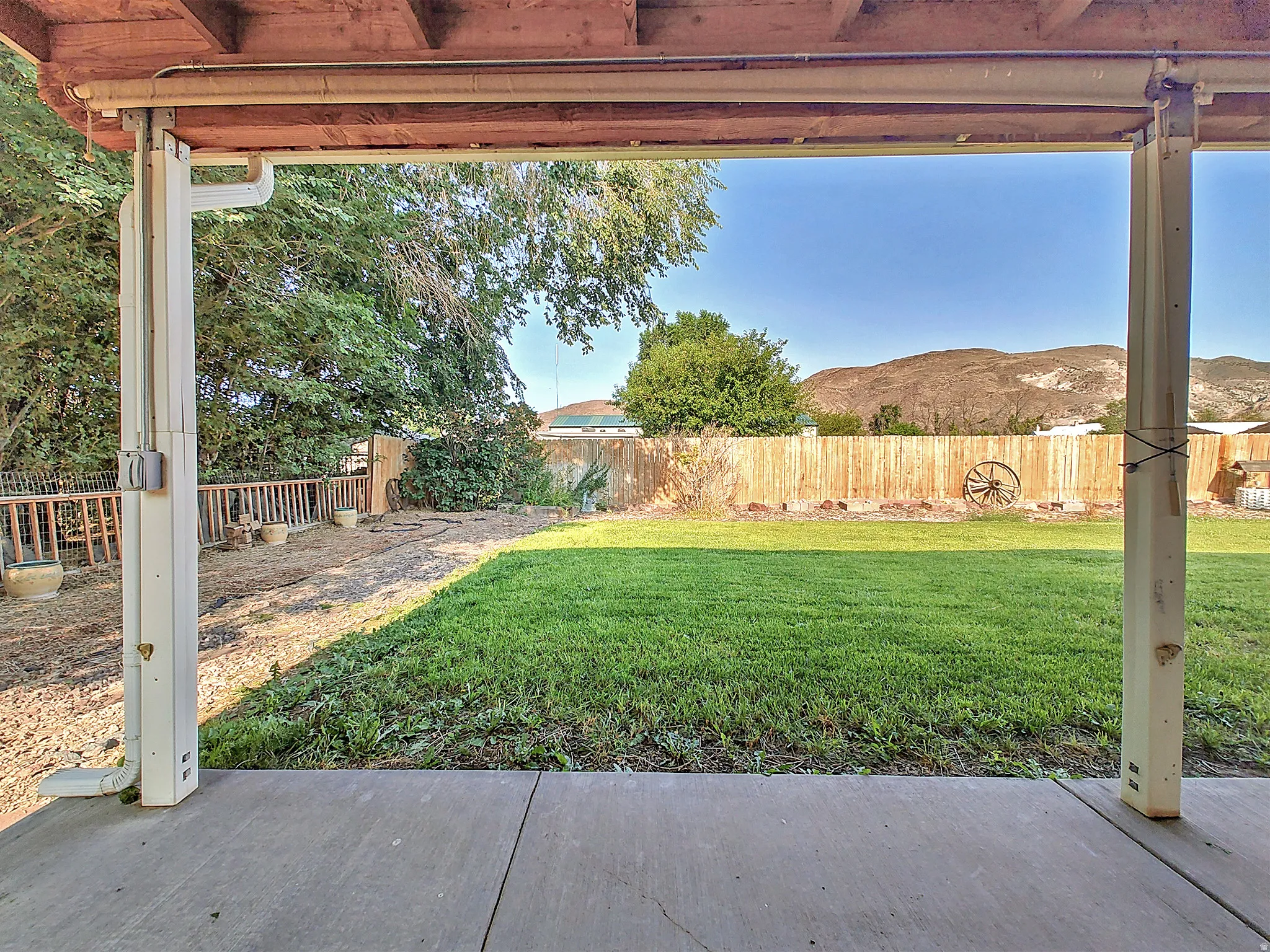 Covered patio with a concrete surface