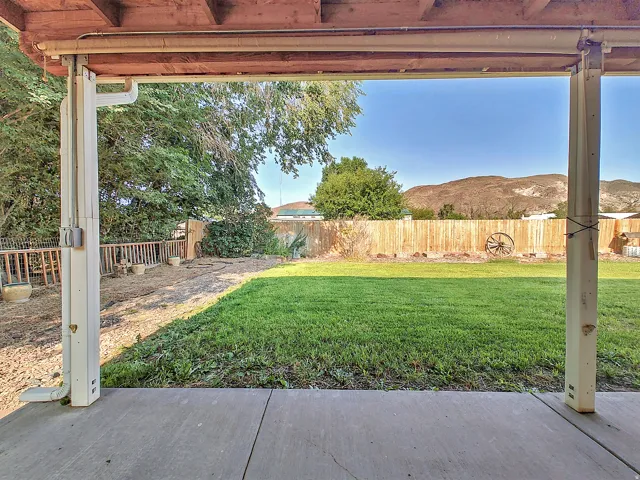 Covered patio with a concrete surface