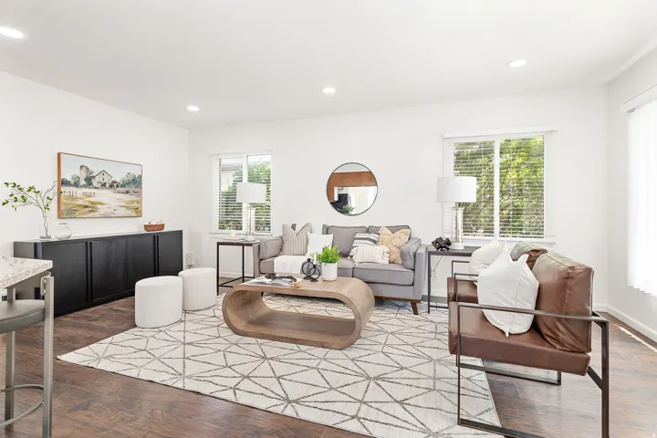 Spacious interior featuring wood-finish flooring and recessed lighting