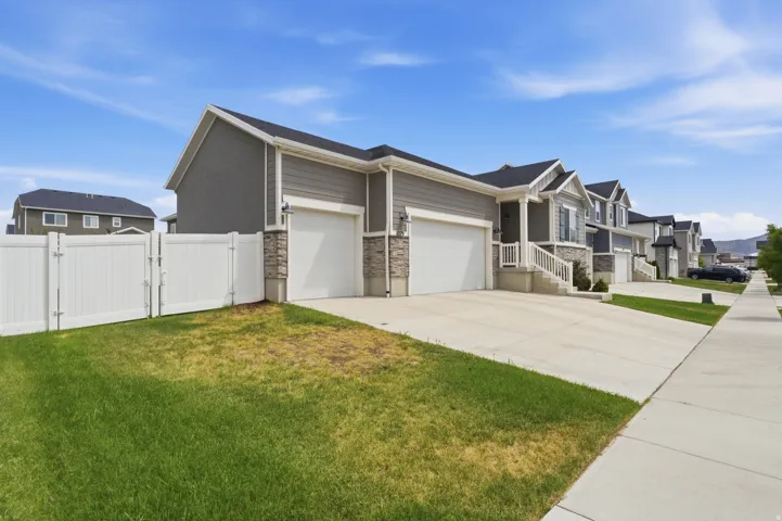 Neutral-toned exterior with horizontal siding and stone accents