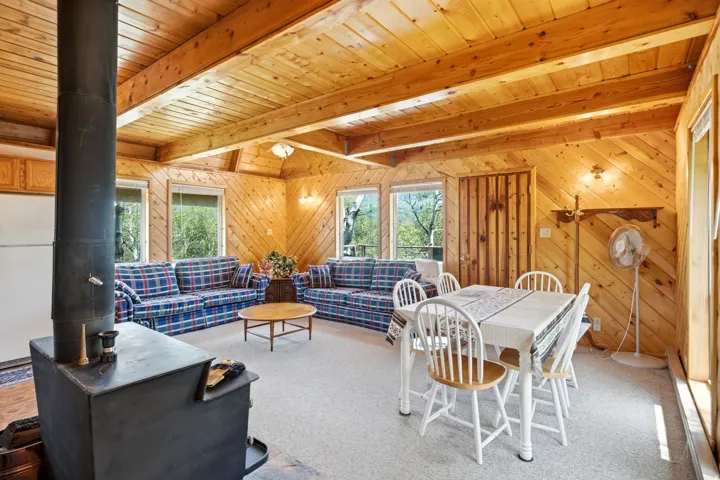 Vaulted wood-paneled ceilings with exposed beams