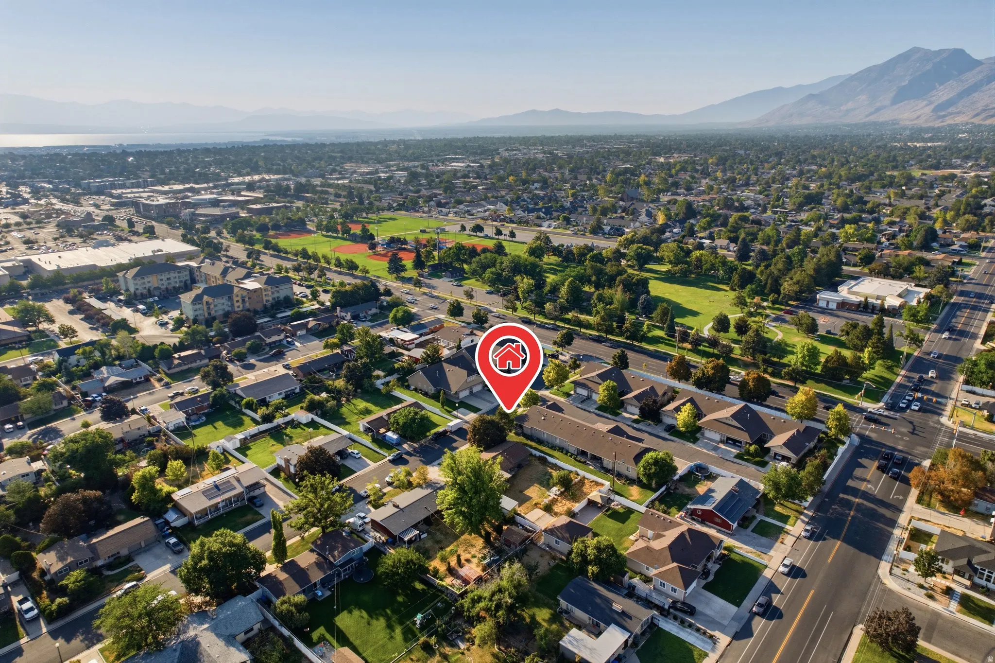 Prime residential location in established neighborhood with mature landscaping, tree-lined streets, and proximity to open green spaces