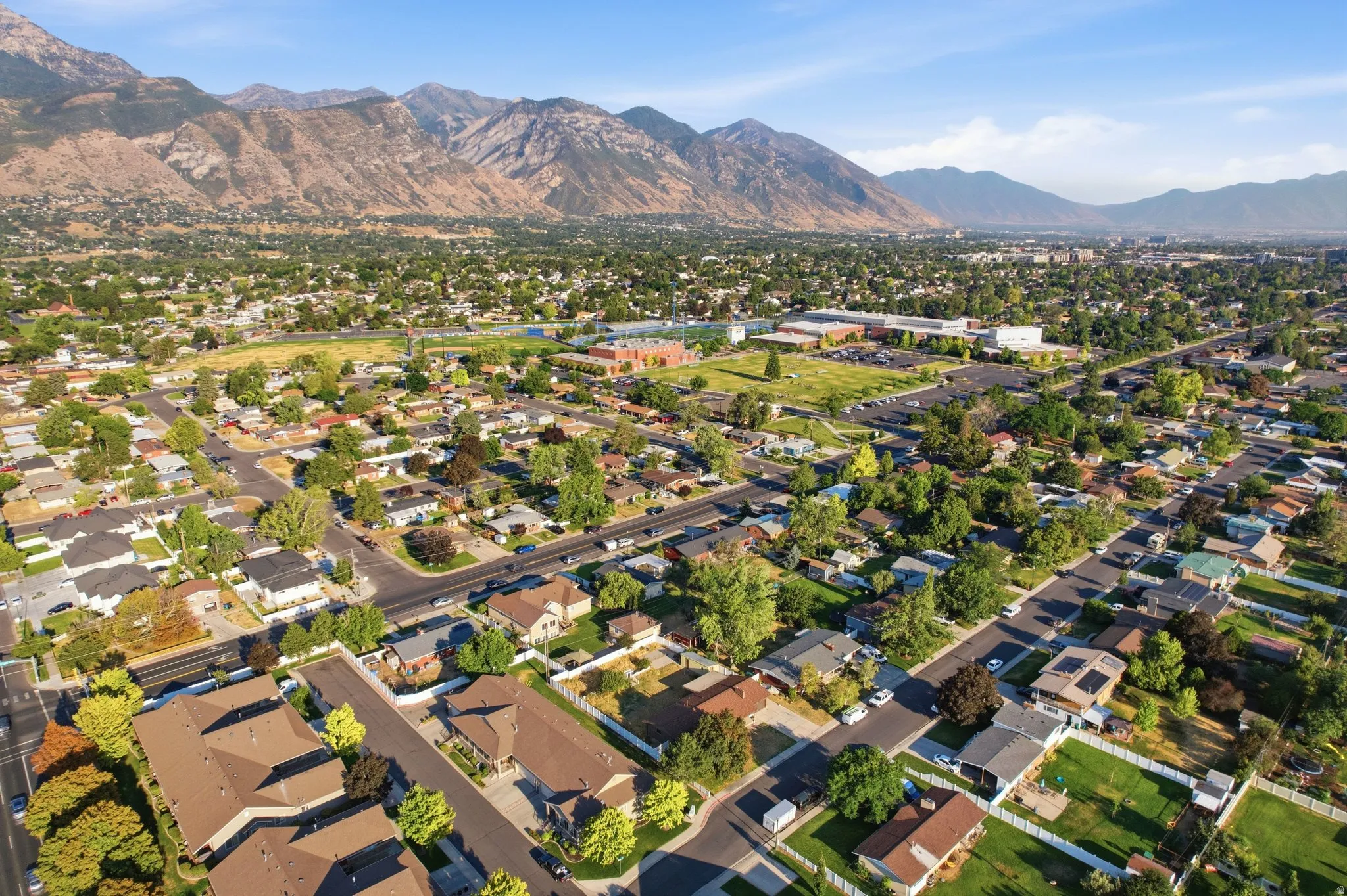 Expansive residential neighborhood featuring numerous single-family homes with varying rooflines and mature landscaping