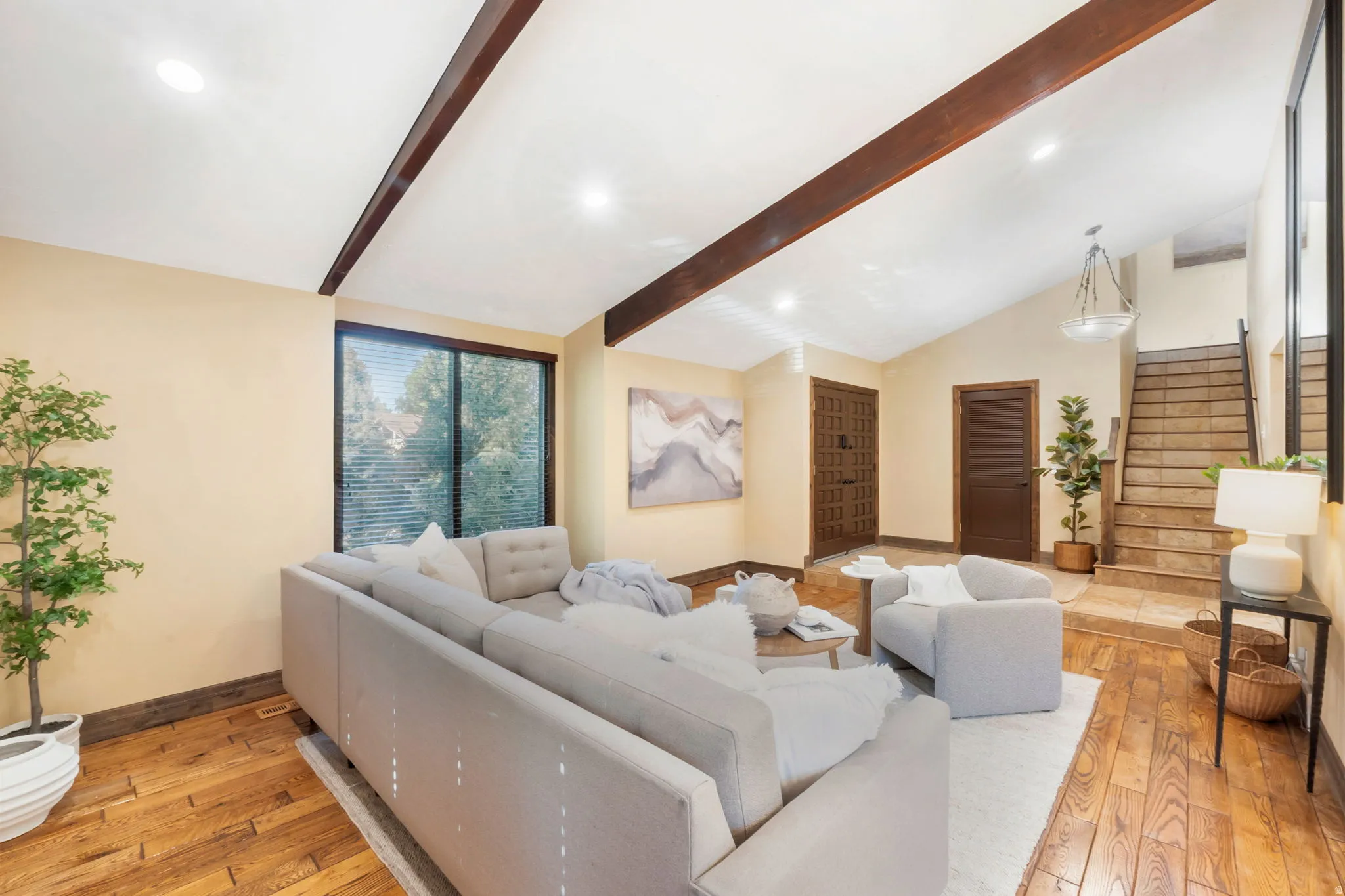 Vaulted ceiling with exposed wood beams