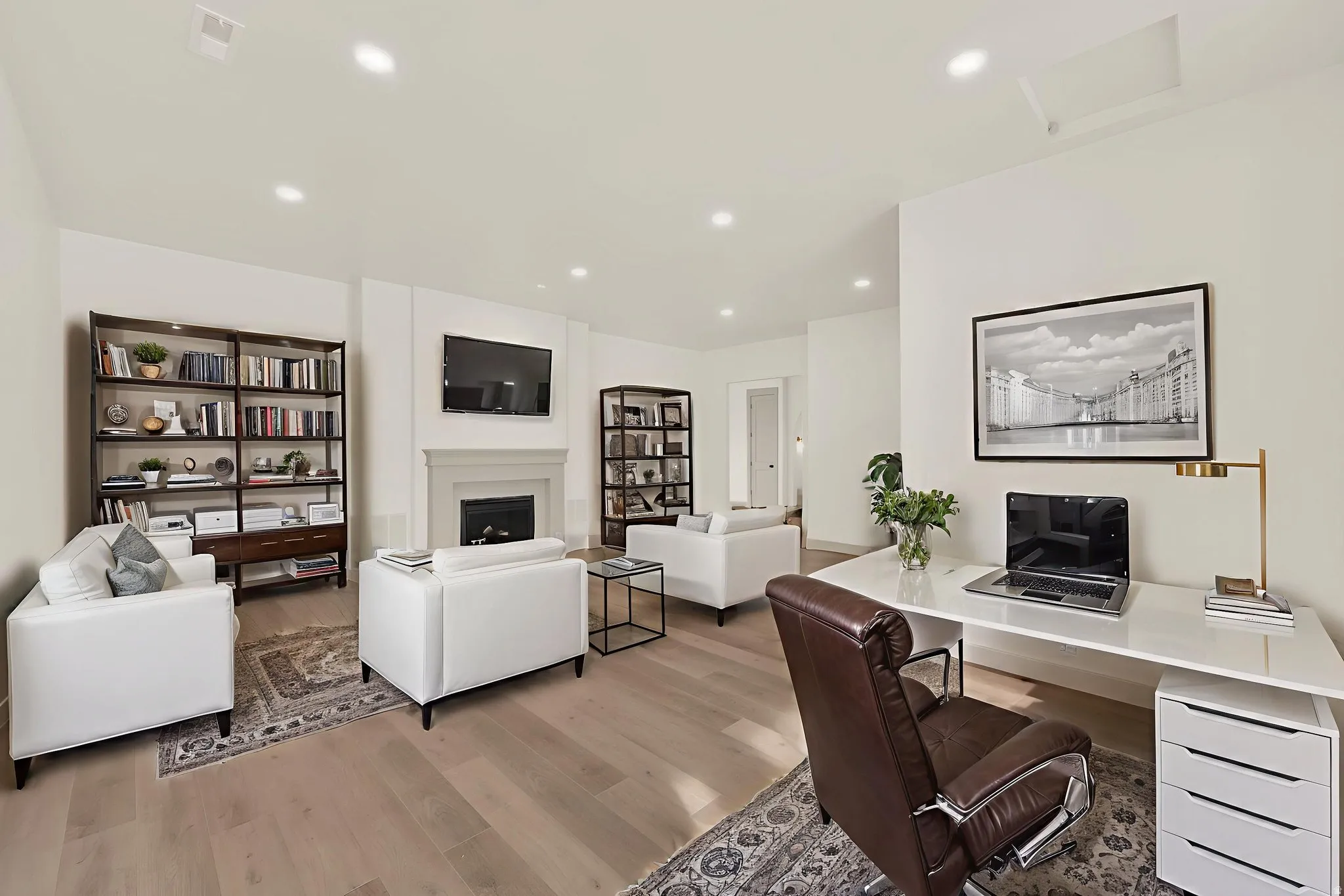 Virtually staged office option 2 with sitting area around fireplace