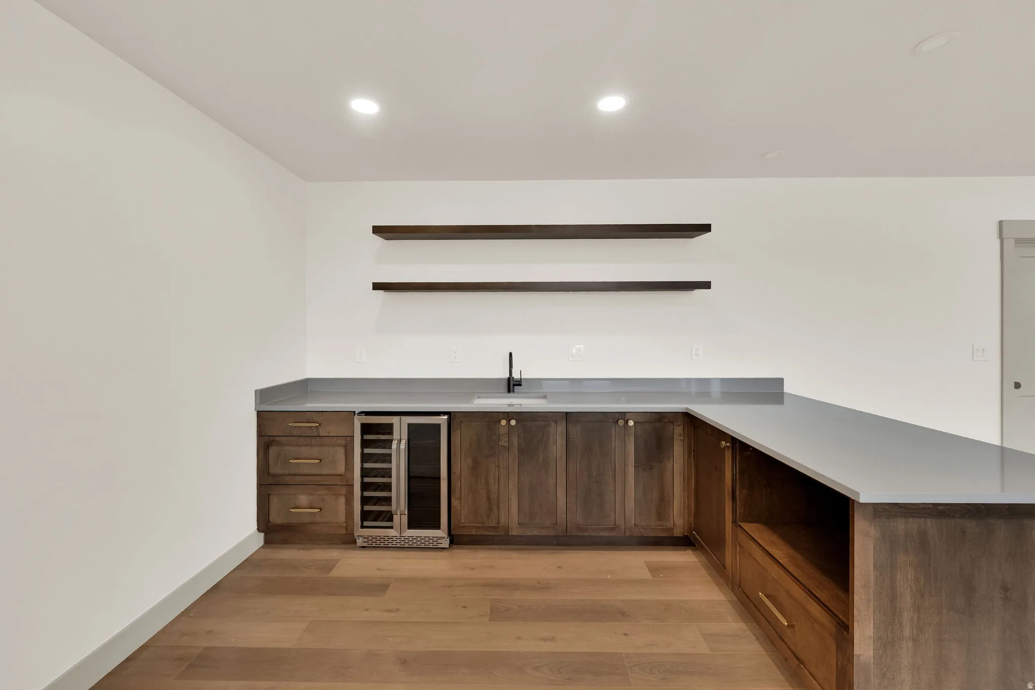 Wet bar with floating shelves