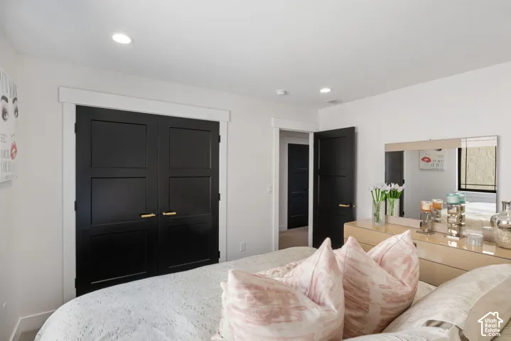 Interior room with recessed lighting and bright white walls