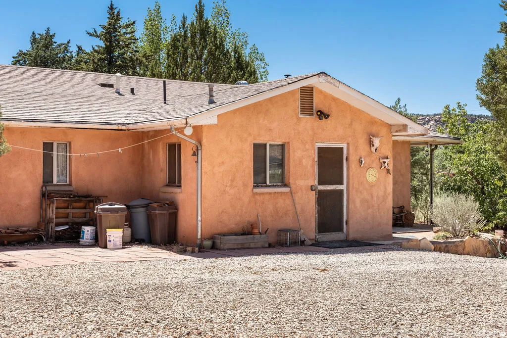 Southwestern-style exterior with stucco finish and a pitched roof