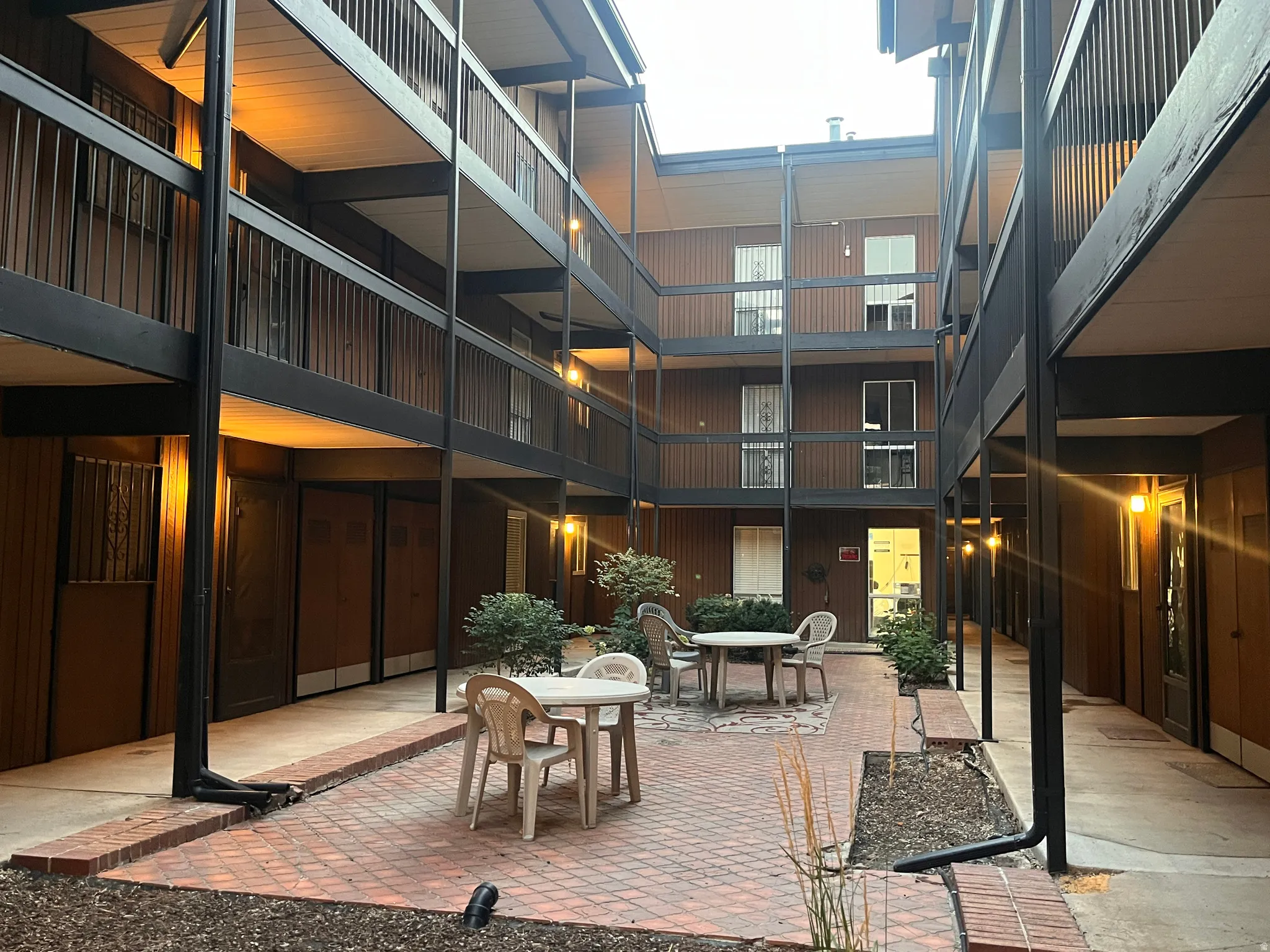 Central brick courtyard with surrounding multi-story building