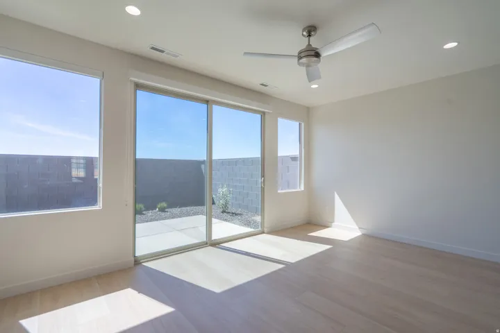 Spacious room with light wood-finish flooring