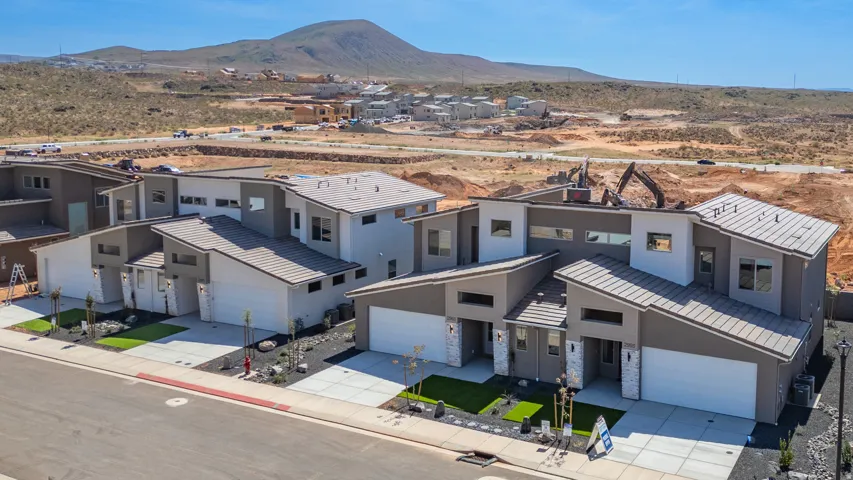 Modern townhome-style residences featuring contemporary architecture and a clean aesthetic
