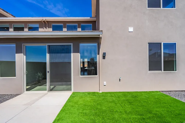 Exterior featuring stucco siding and a concrete patio