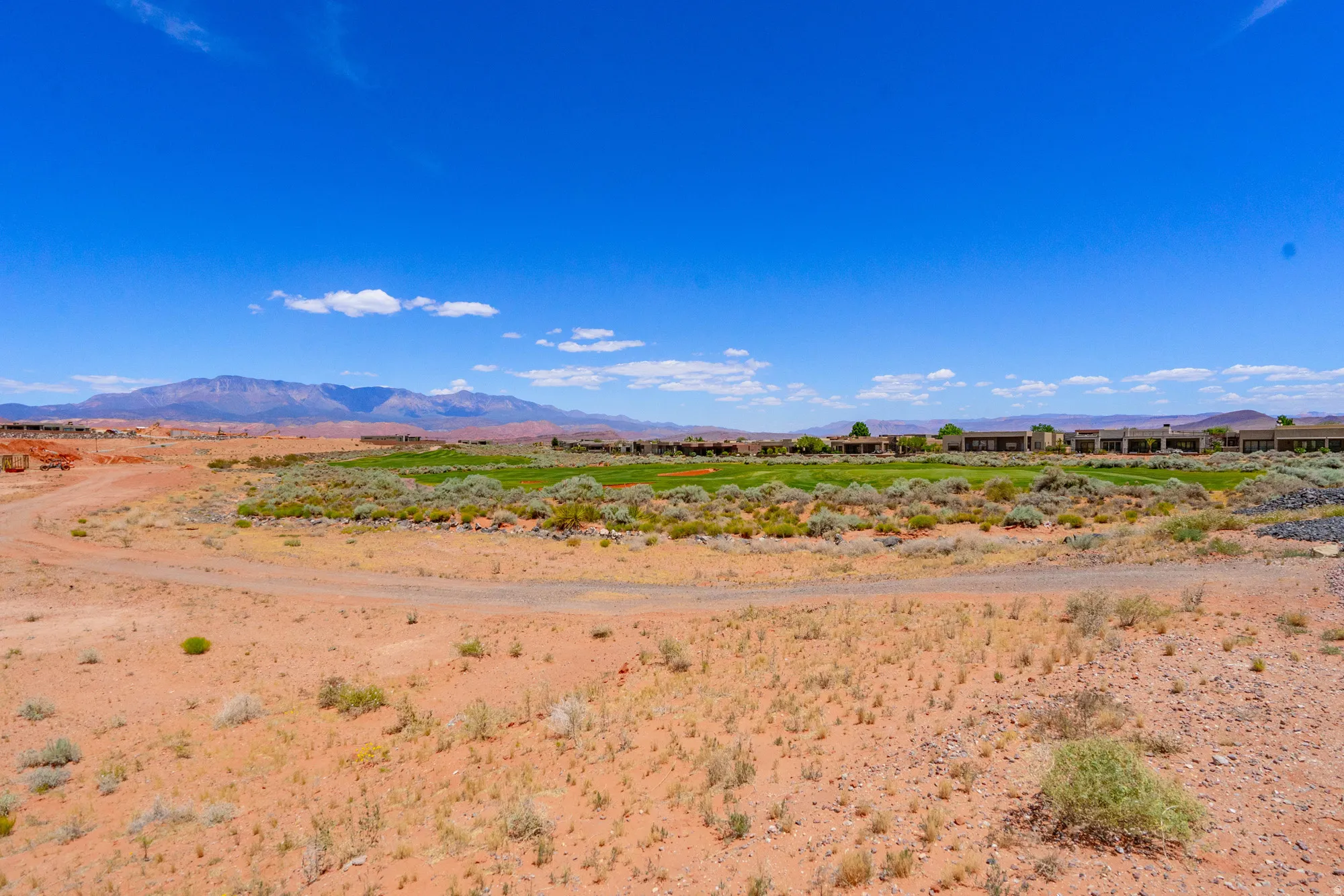 Expansive raw land with desert terrain and sparse native vegetation