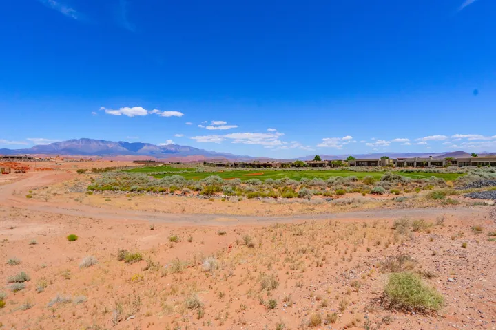 Expansive raw land with desert terrain and sparse native vegetation