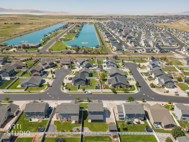Residential development featuring organized street layouts and uniform housing styles
