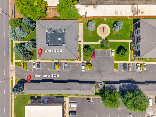 Aerial perspective showcasing Unit 302 and Garage 302 within a multi-building complex