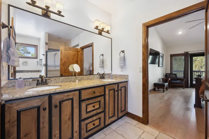 Dual vanity with stone countertop and integrated sinks