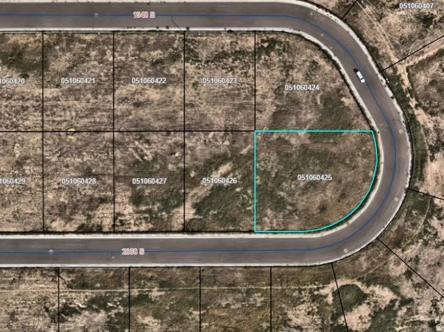 Plat Map. Illustrating the property's parcel boundary and its relation to surrounding lots and roadways