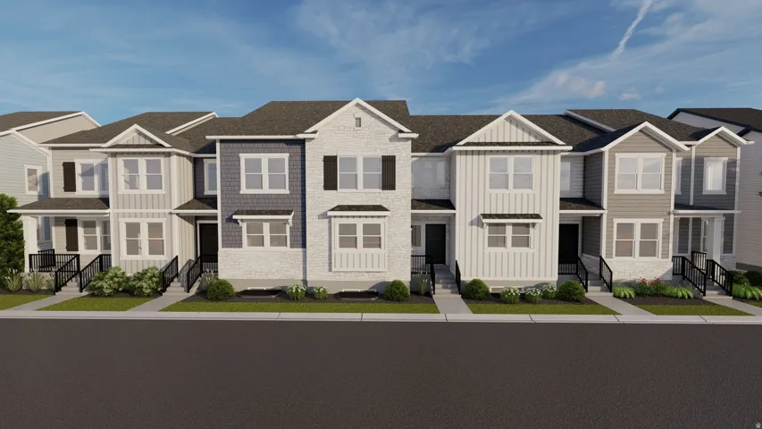 Contemporary townhome exterior featuring varied siding, dark-framed windows, contrasting shutters, and a low-maintenance landscape