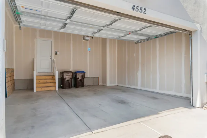 Spacious two-car garage with an automatic overhead door