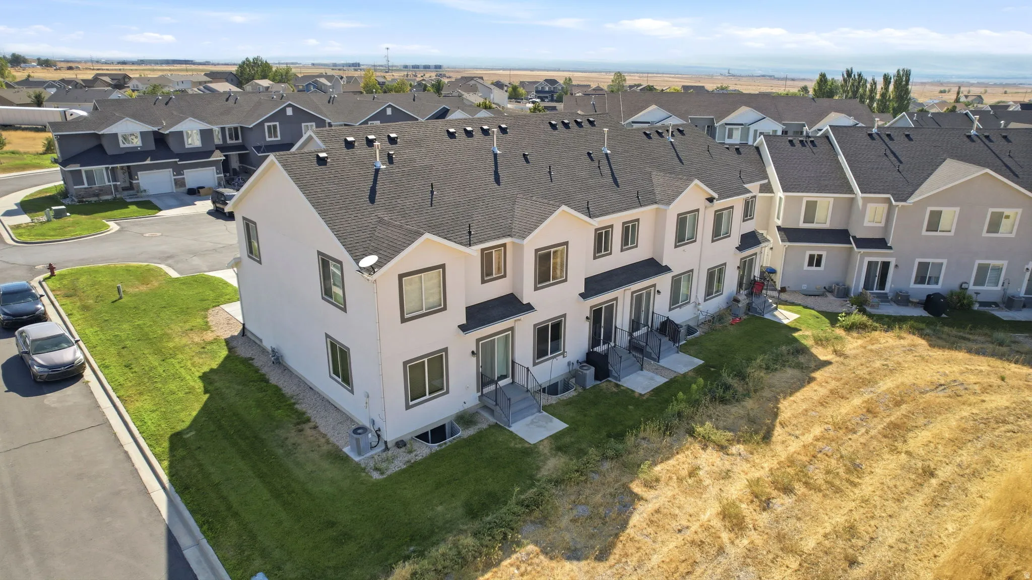 Elegant townhome community featuring multiple residences with distinctive architectural styles