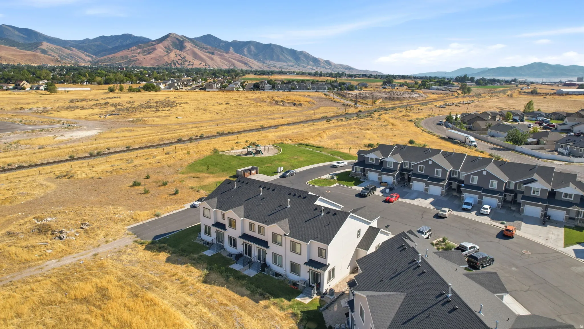 Newly constructed residential community featuring modern architectural design with multi-unit townhome-style construction