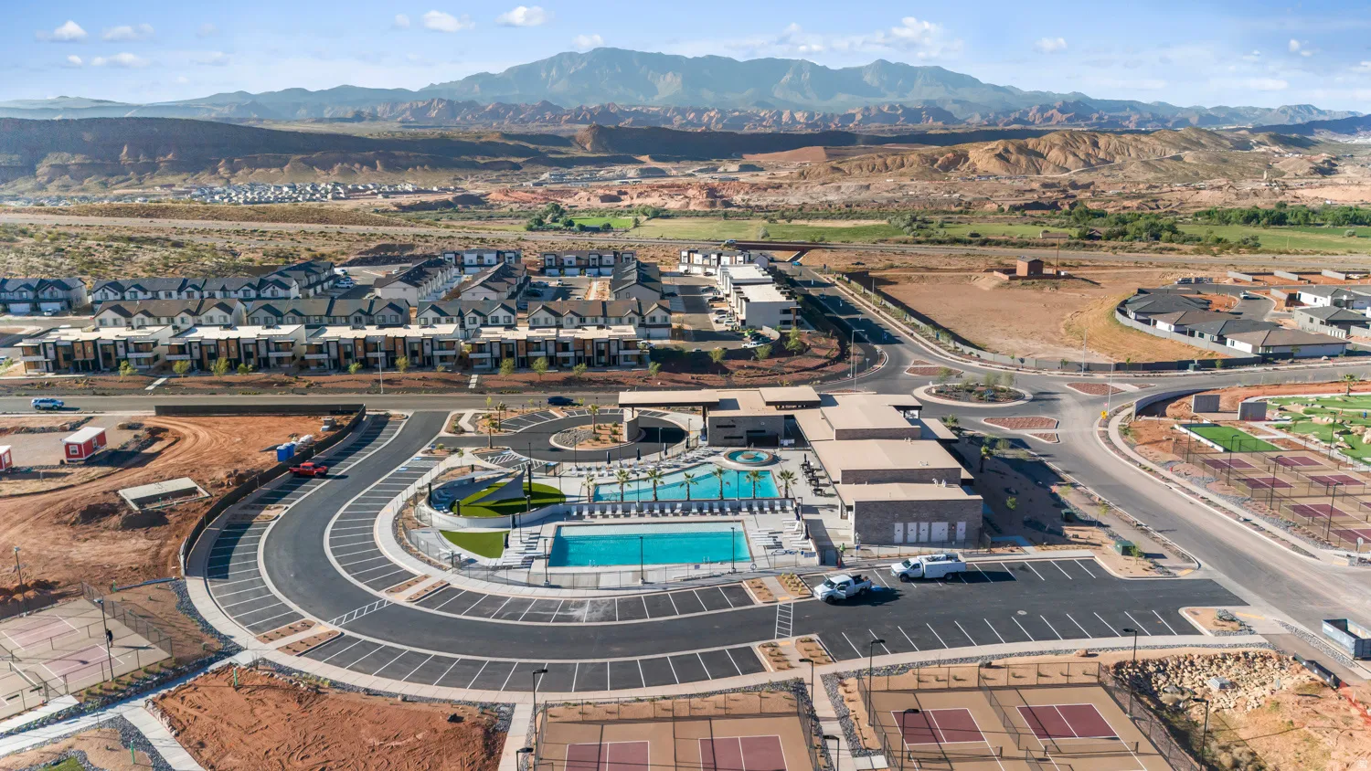 Aerial perspective showcasing a community with numerous amenities
