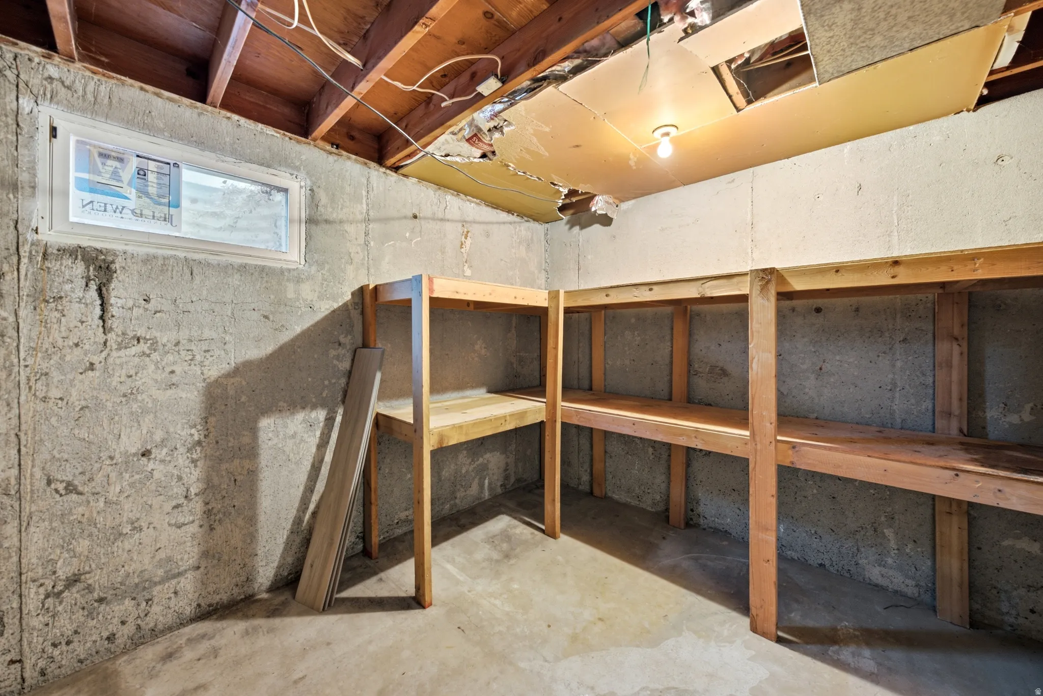 Concrete foundation walls with a single small window