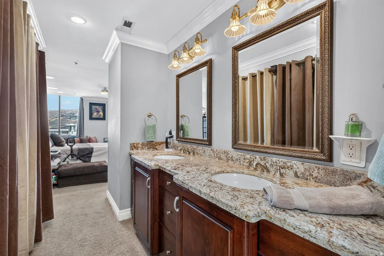 Double vanity with granite countertops and undermount sinks