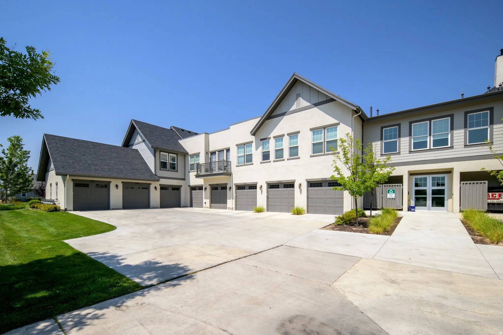 Contemporary multi-unit exterior featuring stucco and siding finishes