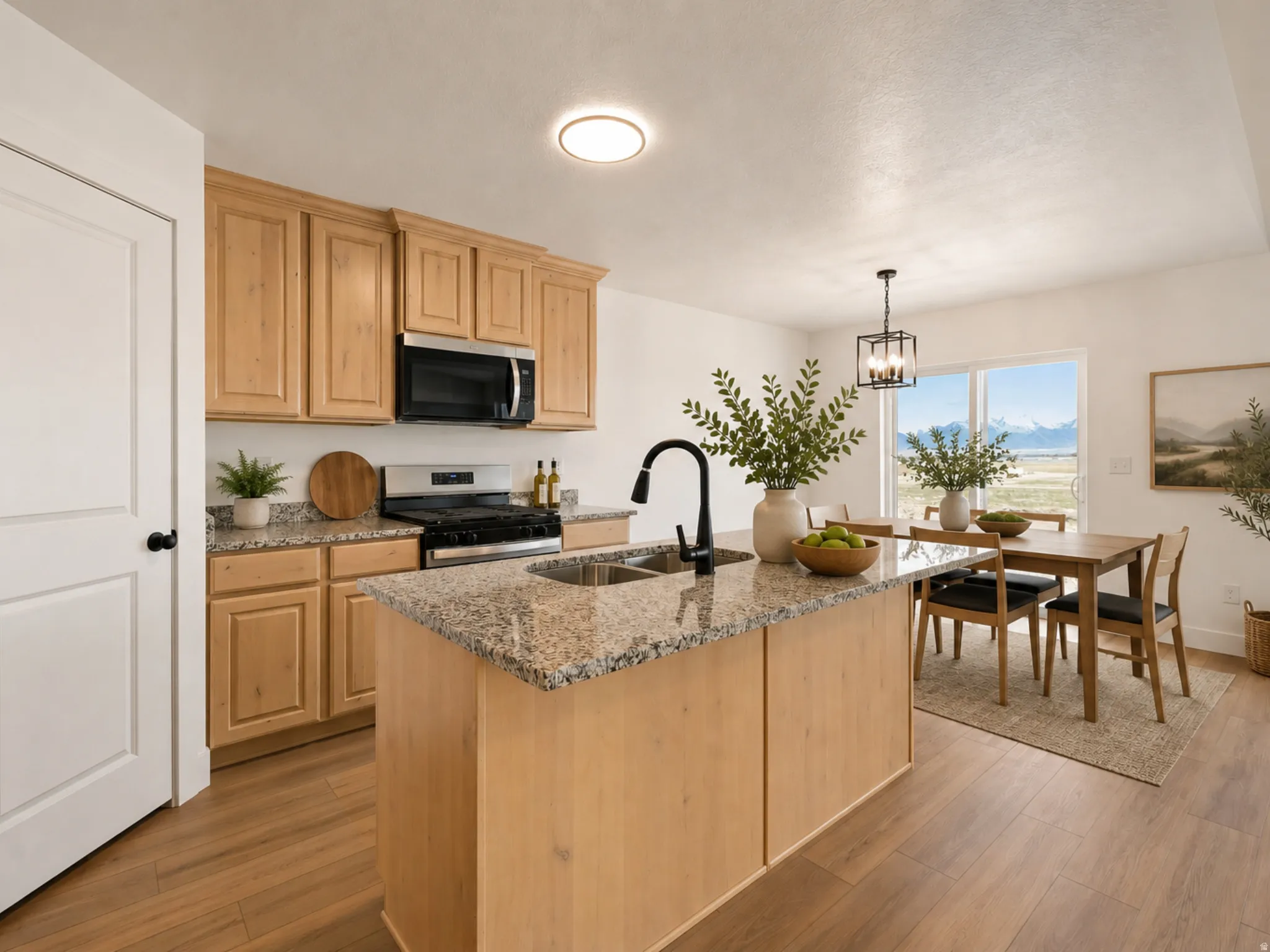 Kitchen island with granite countertop and undermount sink